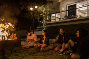 people_sitting_in_front_of_bon_fire